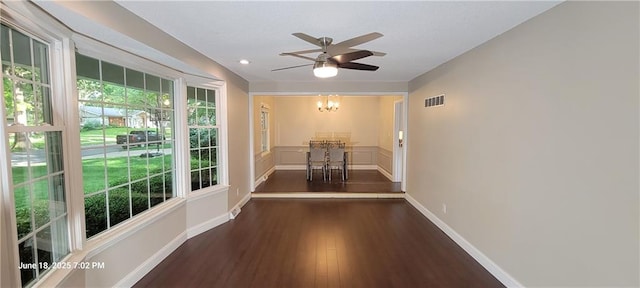 8738 Horton St, Overland Park, KS 66207 - corridor featuring a chandelier, wood finished floors, and recessed lighting