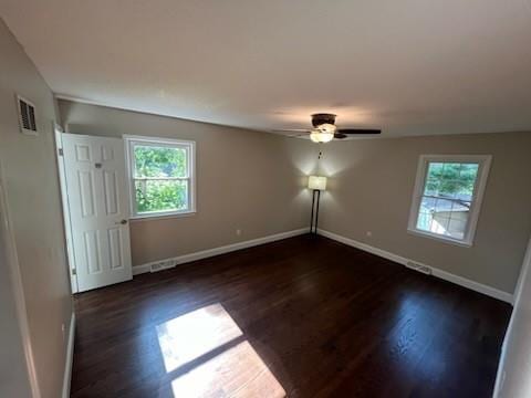 8738 Horton St, Overland Park, KS 66207 - unfurnished room with plenty of natural light, wood finished floors, and ceiling fan
