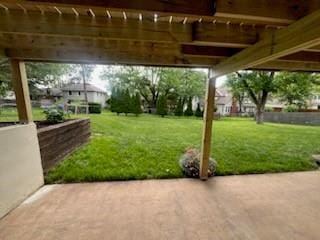 8738 Horton St, Overland Park, KS 66207 - view of grassy yard with a patio area