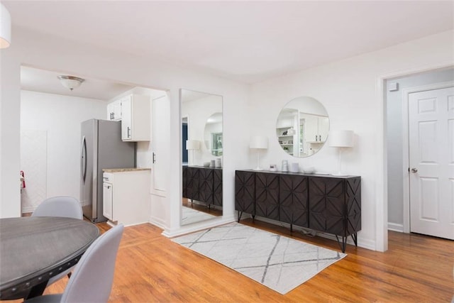 5915 Fontana St, Fairway, KS 66205 - dining space featuring light wood-style floors and baseboards