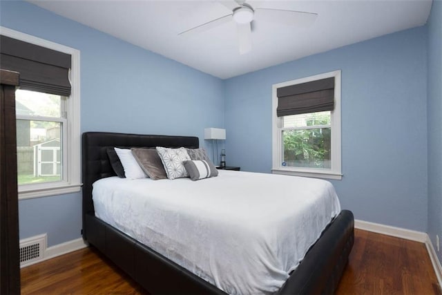 5915 Fontana St, Fairway, KS 66205 - bedroom with multiple windows, wood finished floors, and ceiling fan