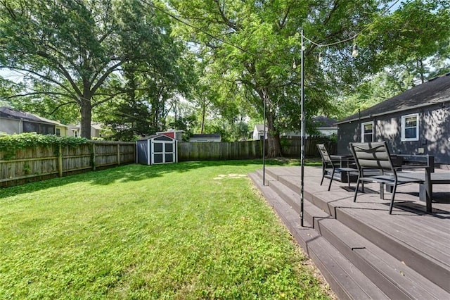 5915 Fontana St, Fairway, KS 66205 - fenced backyard featuring a storage unit, outdoor dining area, and a patio area