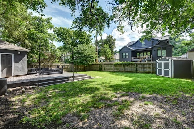 5915 Fontana St, Fairway, KS 66205 - fenced backyard featuring a storage shed and a deck