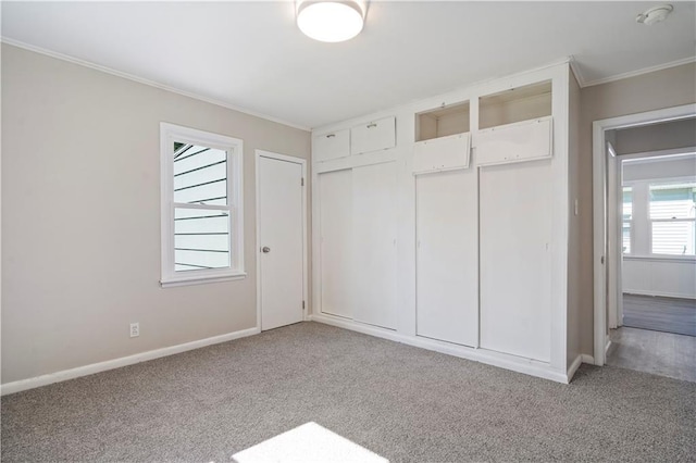15309 E Mayes Rd, Independence, MO 64050 - unfurnished bedroom with crown molding, carpet, and a closet