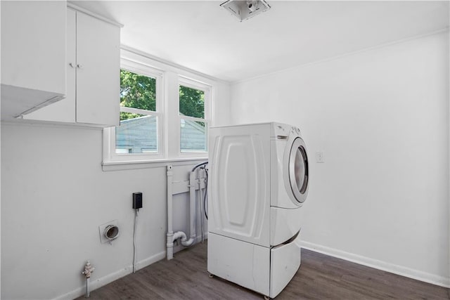 15309 E Mayes Rd, Independence, MO 64050 - laundry room featuring washer / clothes dryer, dark wood finished floors, and cabinet space