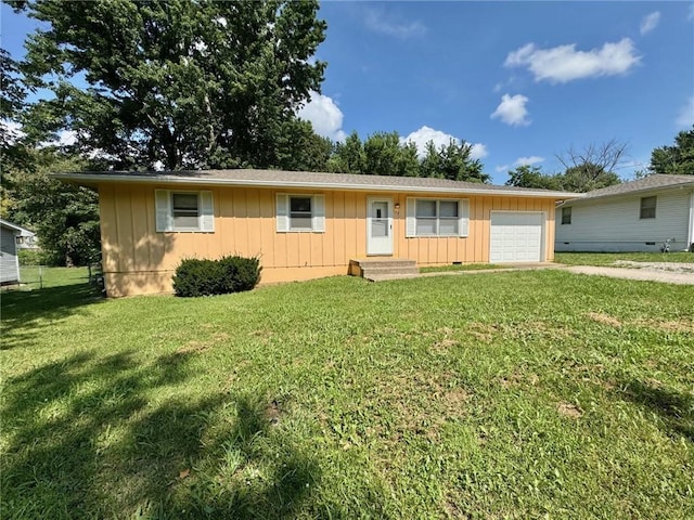 177 SE 411th Rd, Warrensburg, MO 64093 - single story home featuring board and batten siding, an attached garage, driveway, and a front lawn
