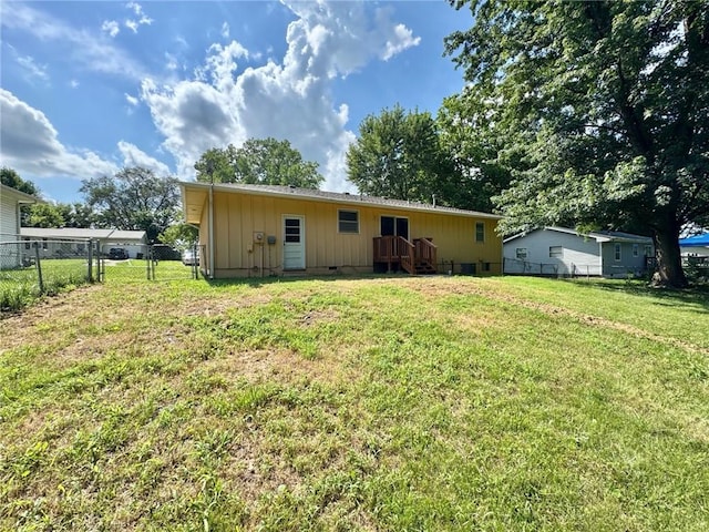 177 SE 411th Rd, Warrensburg, MO 64093 - rear view of property with board and batten siding and crawl space