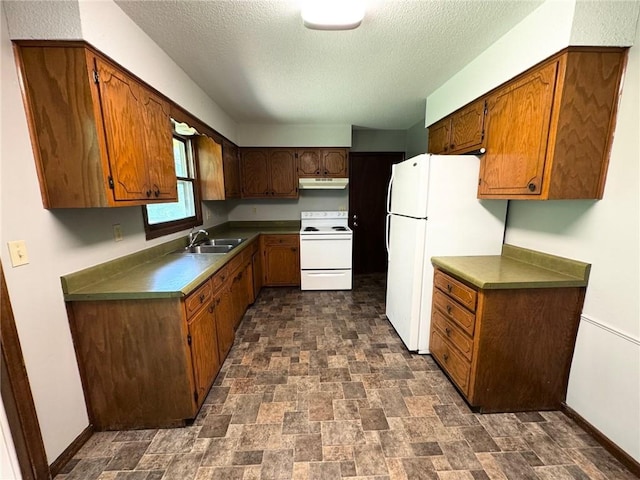 177 SE 411th Rd, Warrensburg, MO 64093 - kitchen featuring white appliances, under cabinet range hood, stone finish floors, dark countertops, and a textured ceiling