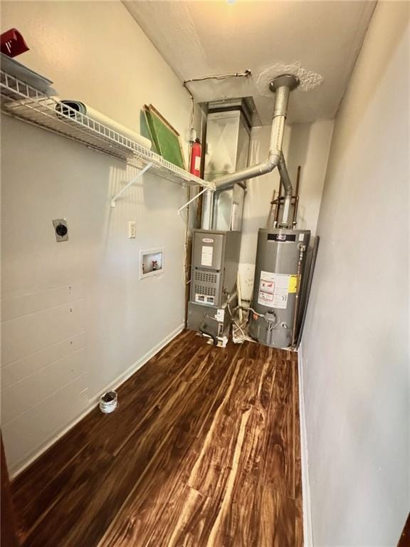 177 SE 411th Rd, Warrensburg, MO 64093 - utility room with gas water heater