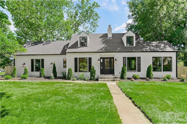 2201 W 74th St, Prairie Village, KS 66208 - view of front of house featuring a chimney and a shingled roof