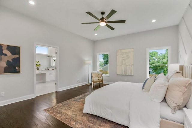 2201 W 74th St, Prairie Village, KS 66208 - bedroom with multiple windows, wood finished floors, recessed lighting, ensuite bath, and a ceiling fan
