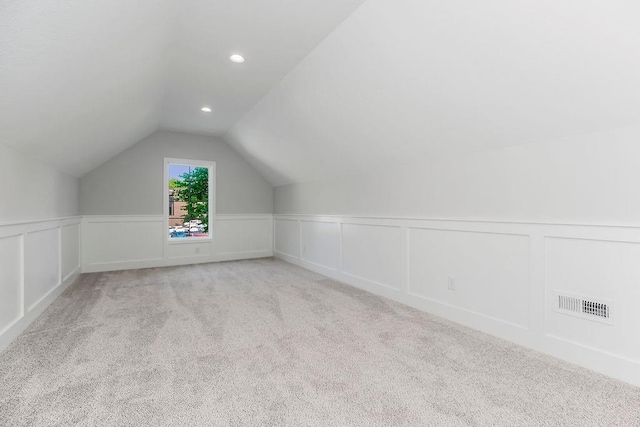 2201 W 74th St, Prairie Village, KS 66208 - additional living space featuring lofted ceiling, a decorative wall, carpet floors, a wainscoted wall, and recessed lighting
