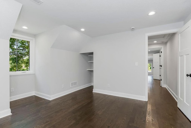 2201 W 74th St, Prairie Village, KS 66208 - empty room featuring dark wood-type flooring, recessed lighting, and a smoke detector