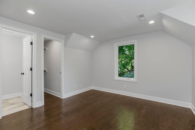 2201 W 74th St, Prairie Village, KS 66208 - bonus room with vaulted ceiling, wood finished floors, and recessed lighting
