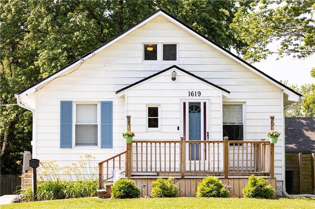 1619 W College St, Independence, MO 64050 - view of front of house featuring a deck