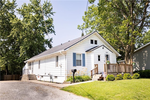 1619 W College St, Independence, MO 64050 - bungalow featuring a wooden deck