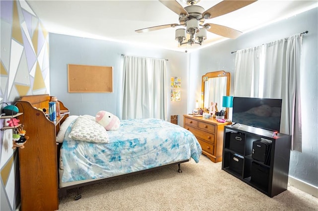 1619 W College St, Independence, MO 64050 - carpeted bedroom featuring ceiling fan