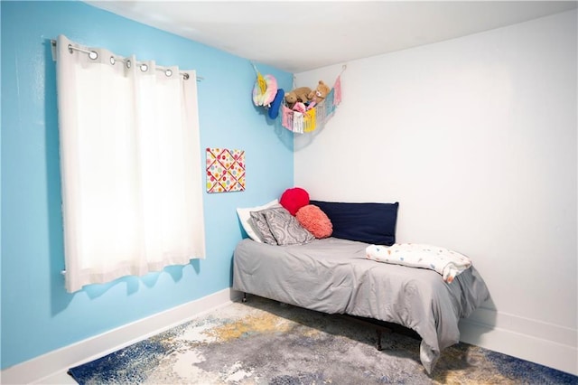 1619 W College St, Independence, MO 64050 - bedroom featuring baseboards