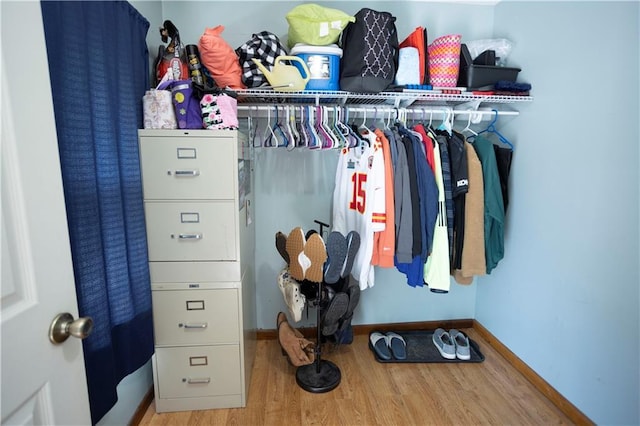 1619 W College St, Independence, MO 64050 - spacious closet with wood finished floors