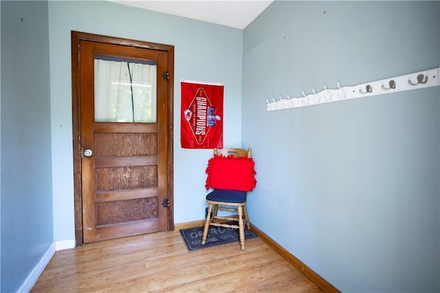 1619 W College St, Independence, MO 64050 - foyer with wood finished floors