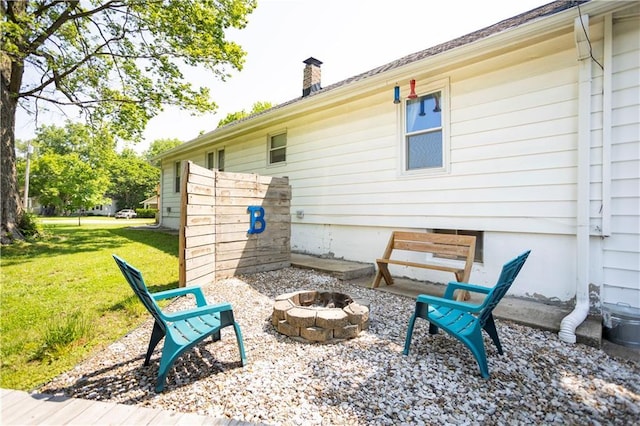 1619 W College St, Independence, MO 64050 - view of patio / terrace featuring a fire pit