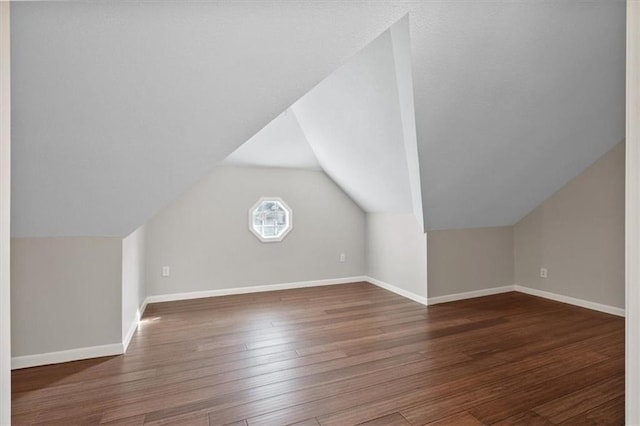 11412 Foster St, Overland Park, KS 66210 - bonus room with wood finished floors and lofted ceiling