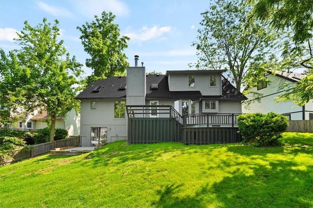 11412 Foster St, Overland Park, KS 66210 - back of property featuring a deck and a chimney