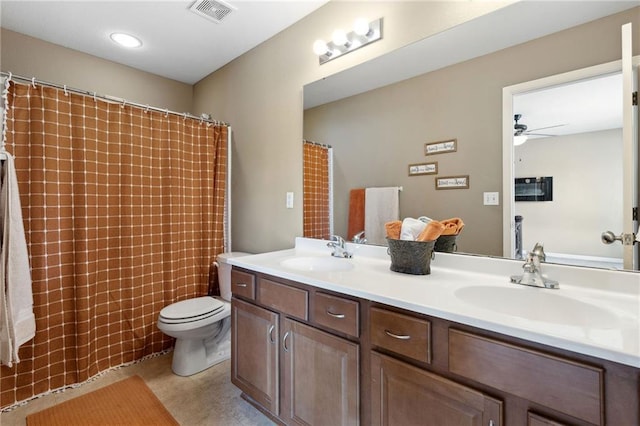 12318 N Wayne Ave, Kansas City, MO 64165 - full bathroom with double vanity, ceiling fan, and a shower with curtain