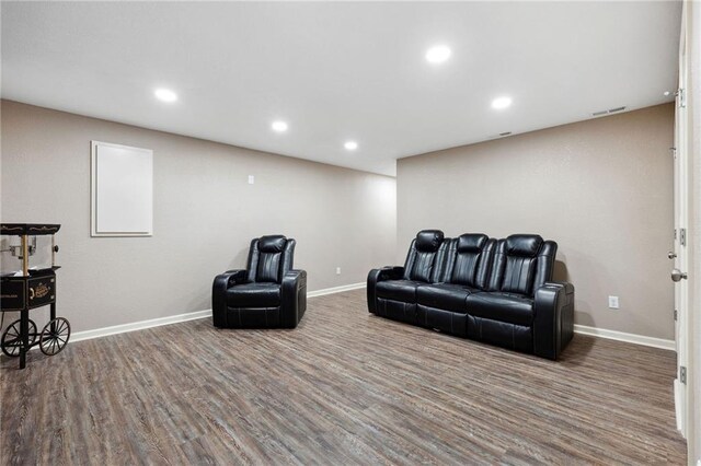 12318 N Wayne Ave, Kansas City, MO 64165 - living room featuring wood finished floors and recessed lighting