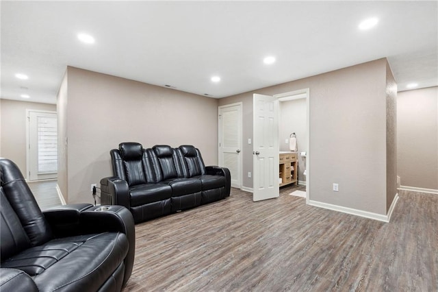 12318 N Wayne Ave, Kansas City, MO 64165 - living area featuring wood finished floors and recessed lighting