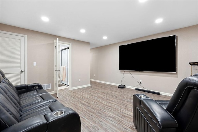 12318 N Wayne Ave, Kansas City, MO 64165 - living area featuring light wood finished floors and recessed lighting