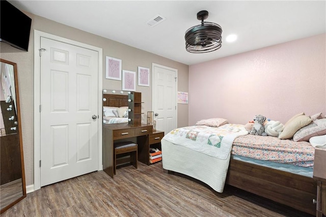 12318 N Wayne Ave, Kansas City, MO 64165 - bedroom featuring wood finished floors