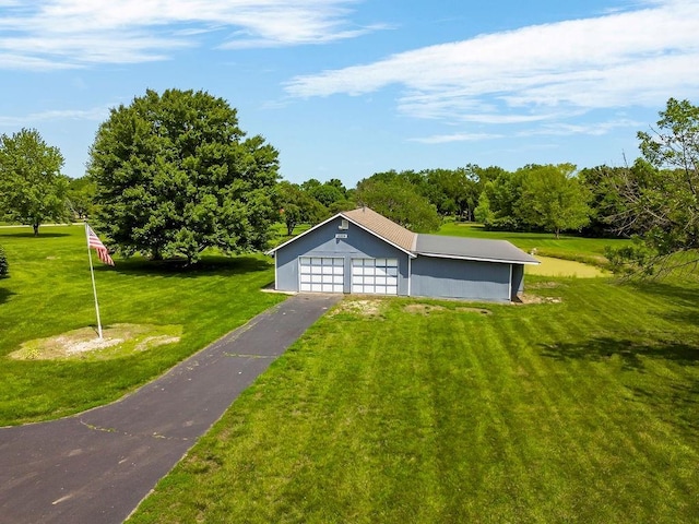 18209 E Moorland St, Pleasant Hill, MO 64080 - garage with driveway