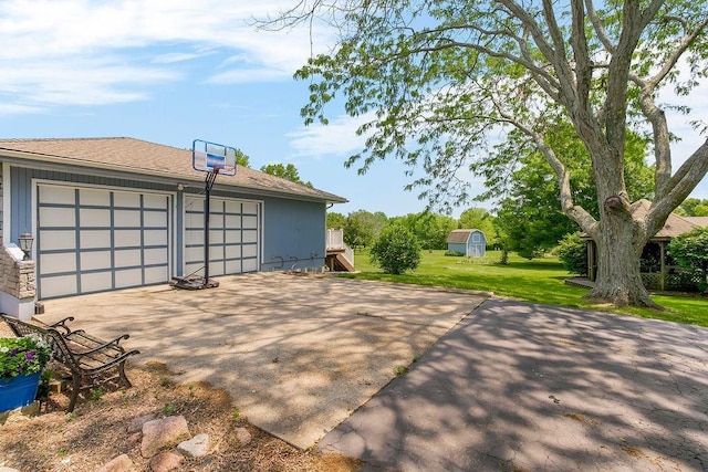 18209 E Moorland St, Pleasant Hill, MO 64080 - detached garage featuring driveway