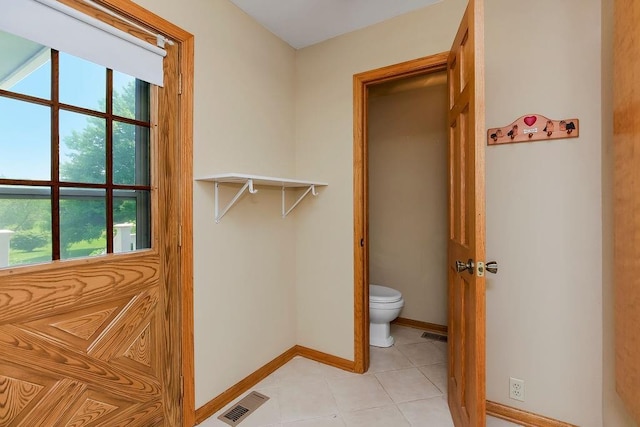 18209 E Moorland St, Pleasant Hill, MO 64080 - bathroom with toilet and tile patterned flooring