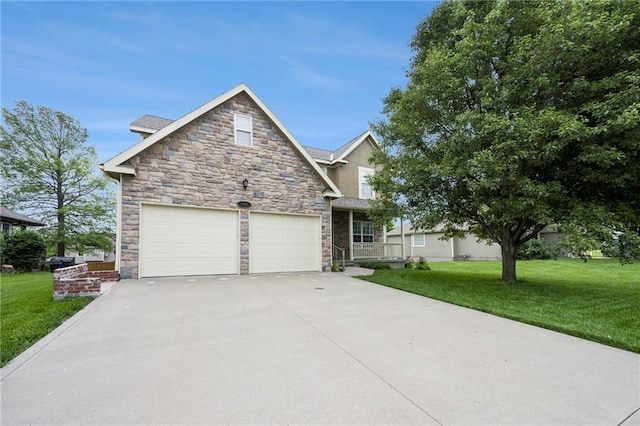 1905 160th St, Basehor, KS 66007 - view of front facade featuring stone siding, driveway, a front lawn, and a garage