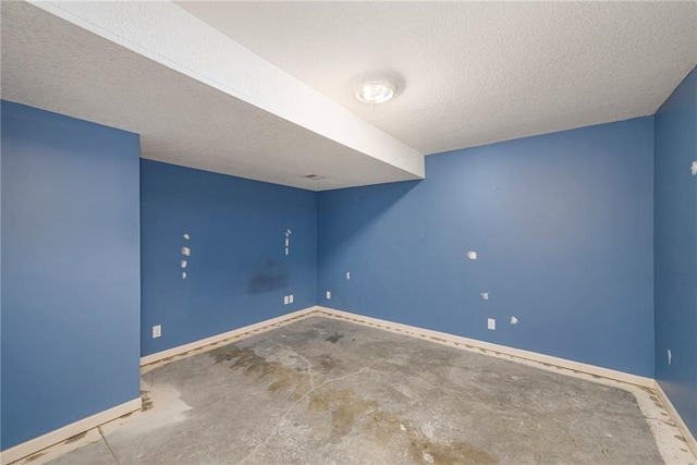 1905 160th St, Basehor, KS 66007 - spare room with a textured ceiling and concrete floors