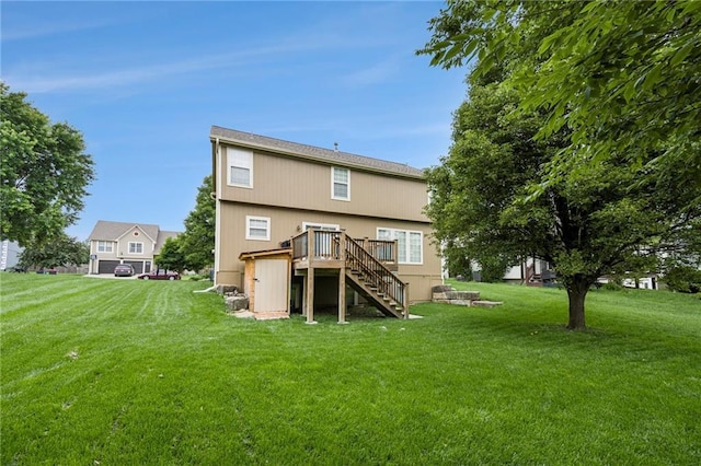 1905 160th St, Basehor, KS 66007 - back of property featuring stairway, a deck, and a lawn