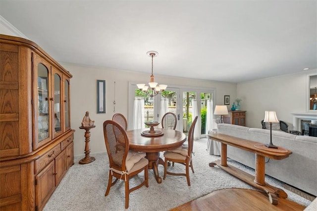 5137 W 75th St, Prairie Village, KS 66208 - dining space with a chandelier, a fireplace, and french doors