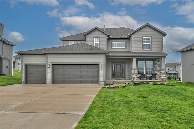 6102 Lewis Dr, Shawnee, KS 66226 - view of front of house featuring a porch, an attached garage, concrete driveway, a front yard, and a shingled roof