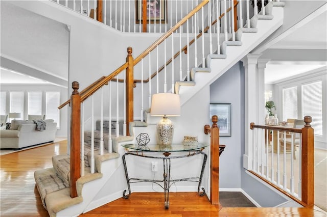 8007 W 131st Ter, Overland Park, KS 66213 - stairway featuring wood finished floors and a high ceiling