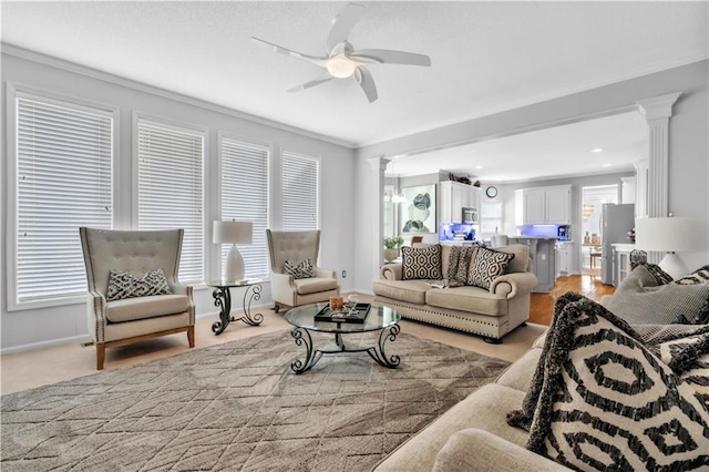 8007 W 131st Ter, Overland Park, KS 66213 - living room with ceiling fan, ornamental molding, healthy amount of natural light, and ornate columns