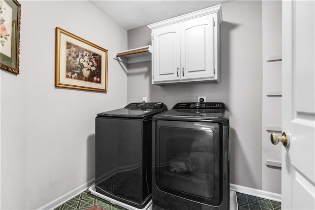 8007 W 131st Ter, Overland Park, KS 66213 - washroom featuring independent washer and dryer, cabinet space, and a textured ceiling