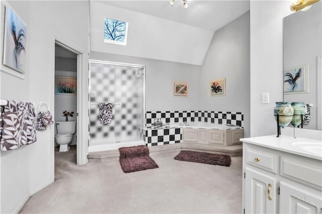 8007 W 131st Ter, Overland Park, KS 66213 - bathroom featuring a bath, vanity, lofted ceiling, and a skylight