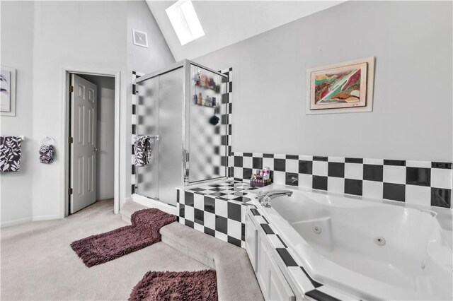 8007 W 131st Ter, Overland Park, KS 66213 - bathroom with a stall shower, a whirlpool tub, a skylight, and lofted ceiling