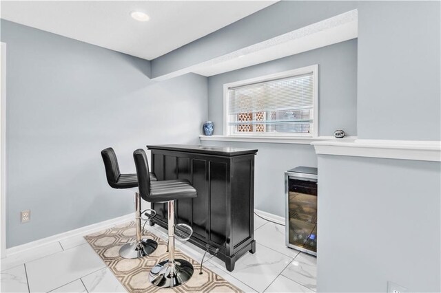 8007 W 131st Ter, Overland Park, KS 66213 - indoor dry bar with marble look tiles and beverage cooler