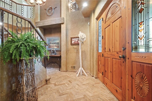 12635 W 183rd St, Overland Park, KS 66013 - foyer with stairway, brick patterned flooring, and plenty of natural light