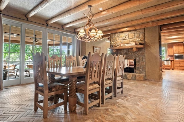 12635 W 183rd St, Overland Park, KS 66013 - dining area with a chandelier, beamed ceiling, and a fireplace