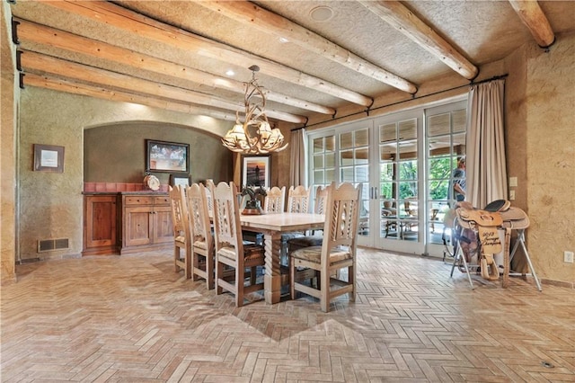 12635 W 183rd St, Overland Park, KS 66013 - dining room with a chandelier, a textured wall, and beam ceiling