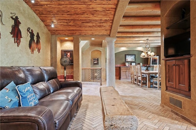 12635 W 183rd St, Overland Park, KS 66013 - living room featuring decorative columns, wood ceiling, a chandelier, and a textured wall